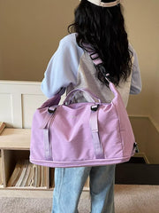 Spacious purple nylon travel bag with adjustable buckle straps and crinkled texture.