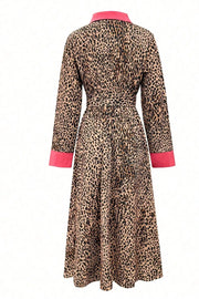 100% polyester Care instructions: Machine wash cold shirt dress in black with A-line silhouette