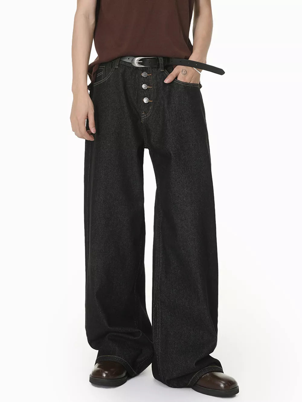 Relaxed fit dark wash denim jeans with button fly and wide leg