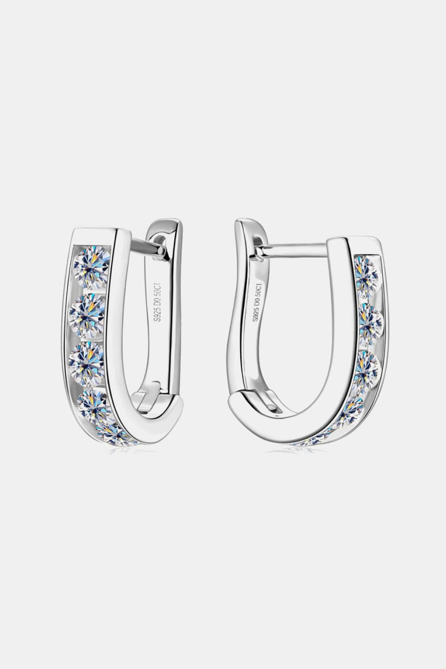Silver pavé-set hoop earrings with clear cubic zirconia stones.