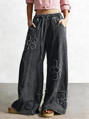 medium blue wide-leg jeans with full-length and drawstring