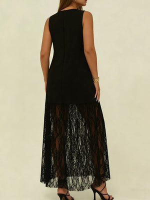 Black plus size maxi dress with sleeveless bodice and sheer lace skirt.