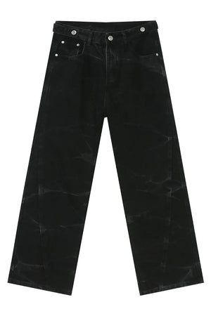 Faded black wide-leg denim jeans with a washed effect and relaxed fit.