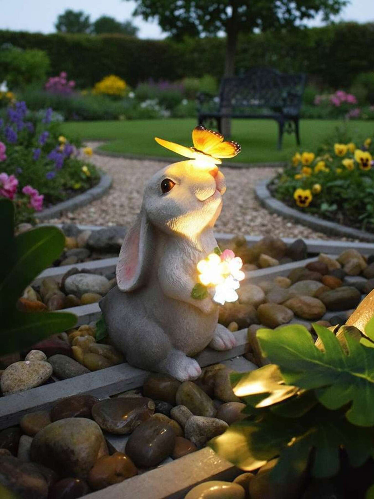 Easter bunny garden ornament with solar butterfly and flower light