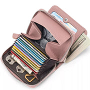 Dusty pink pebbled mini leather card wallet with multiple card slots, coin pouch, and cash compartment.