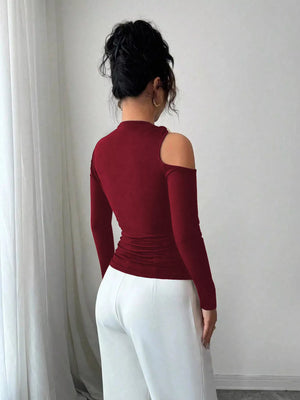 Burgundy one-shoulder t-shirt with cutout detail and long sleeves.