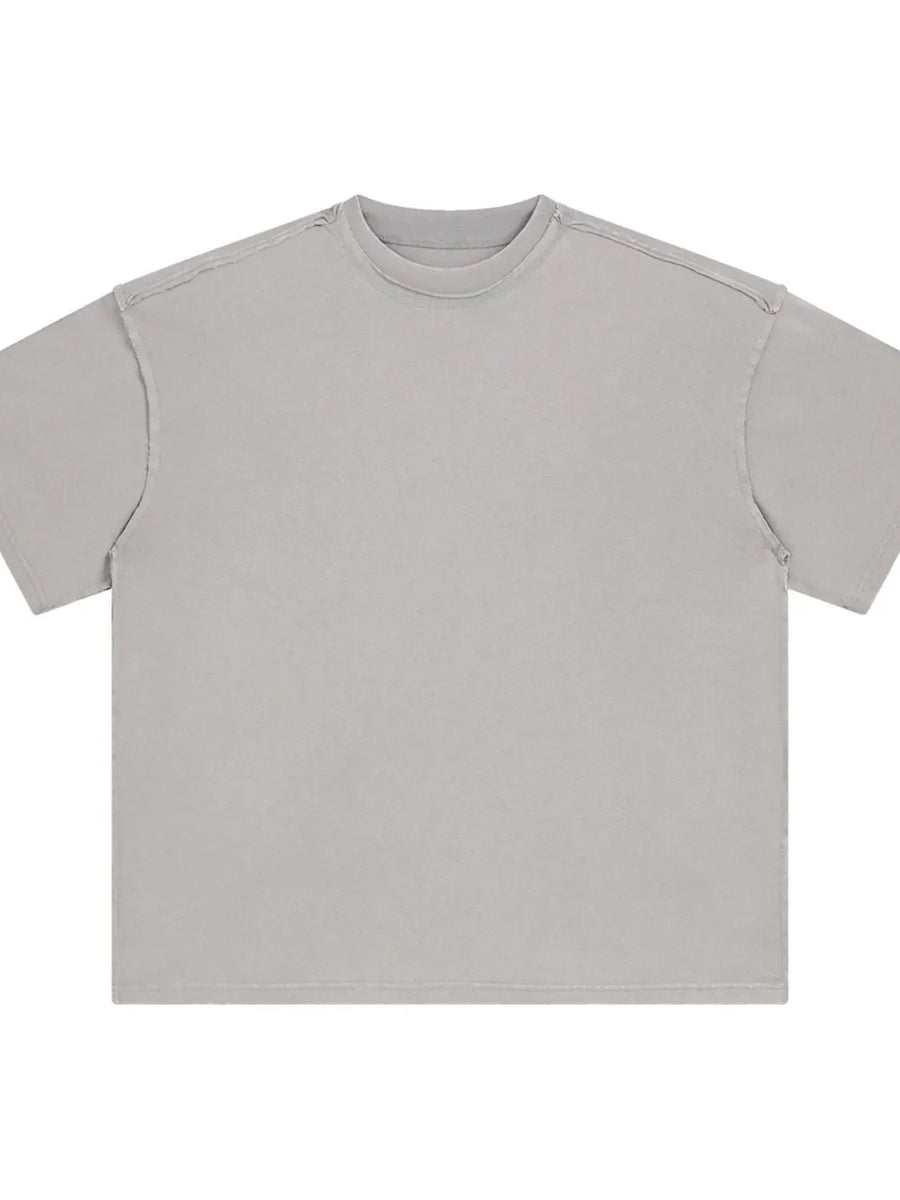 Gray washed cotton tee with raw seams and crew neck.