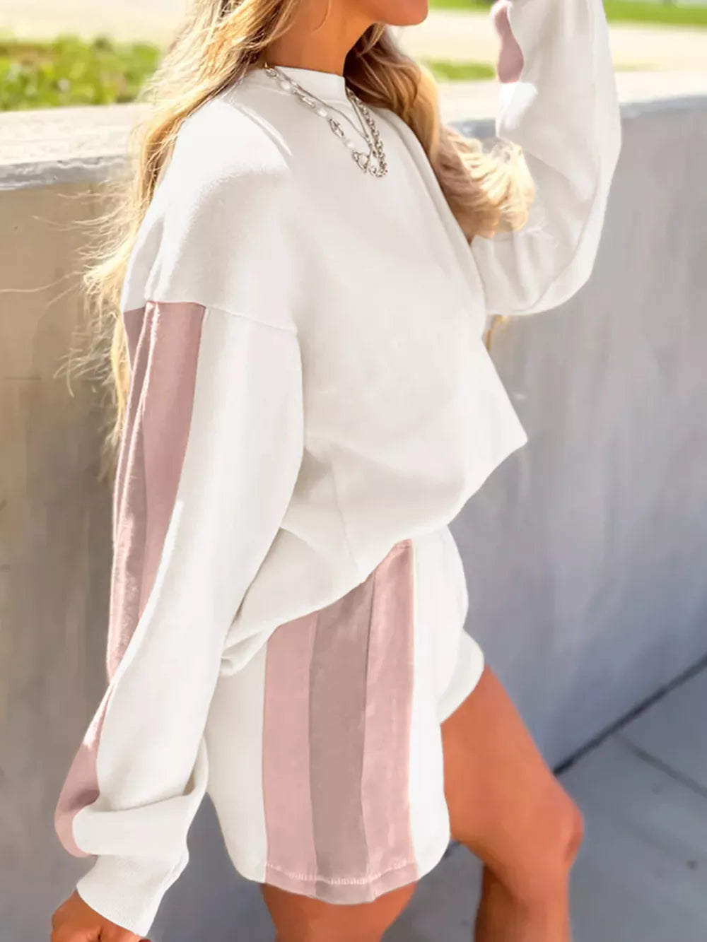 White cotton pullover and shorts set with blush pink color block stripes on sleeves and shorts.