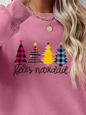 Feliz Navidad graphic crewneck sweatshirt in Blush Pink with festive Christmas trees and script text.
