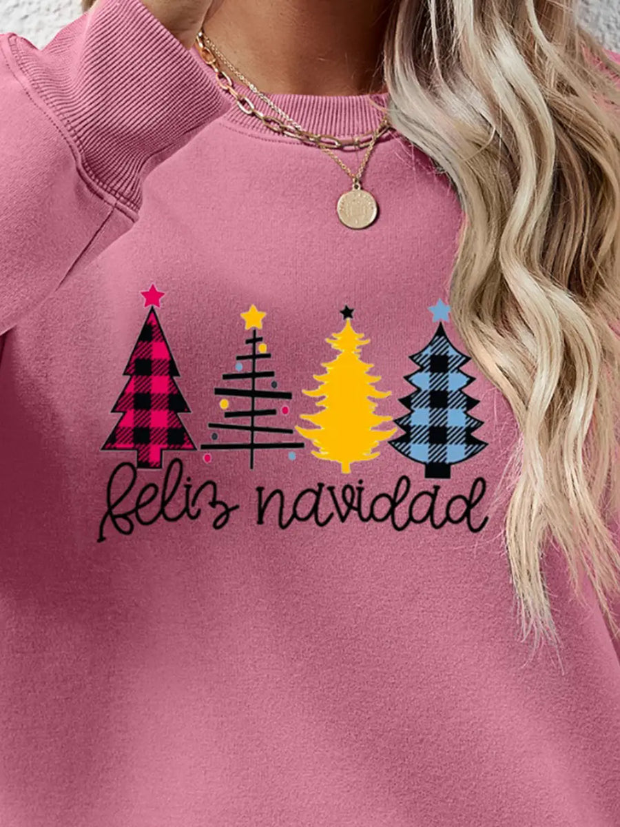 Feliz Navidad graphic crewneck sweatshirt in Blush Pink with festive Christmas trees and script text.