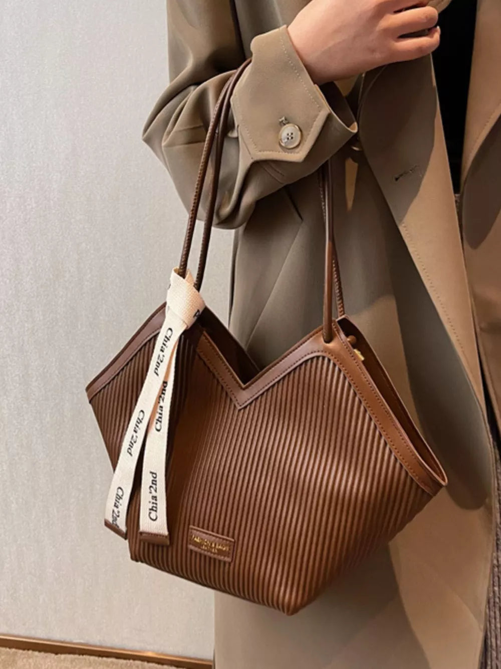 Brown ribbed texture large shoulder bag with white logo straps