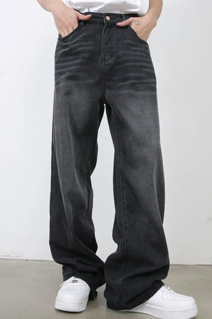 Dark gray wide leg denim jeans with a faded wash and relaxed fit.