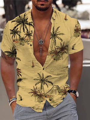 Men's mustard short sleeve button-down shirt with tropical palm tree and sailboat print.