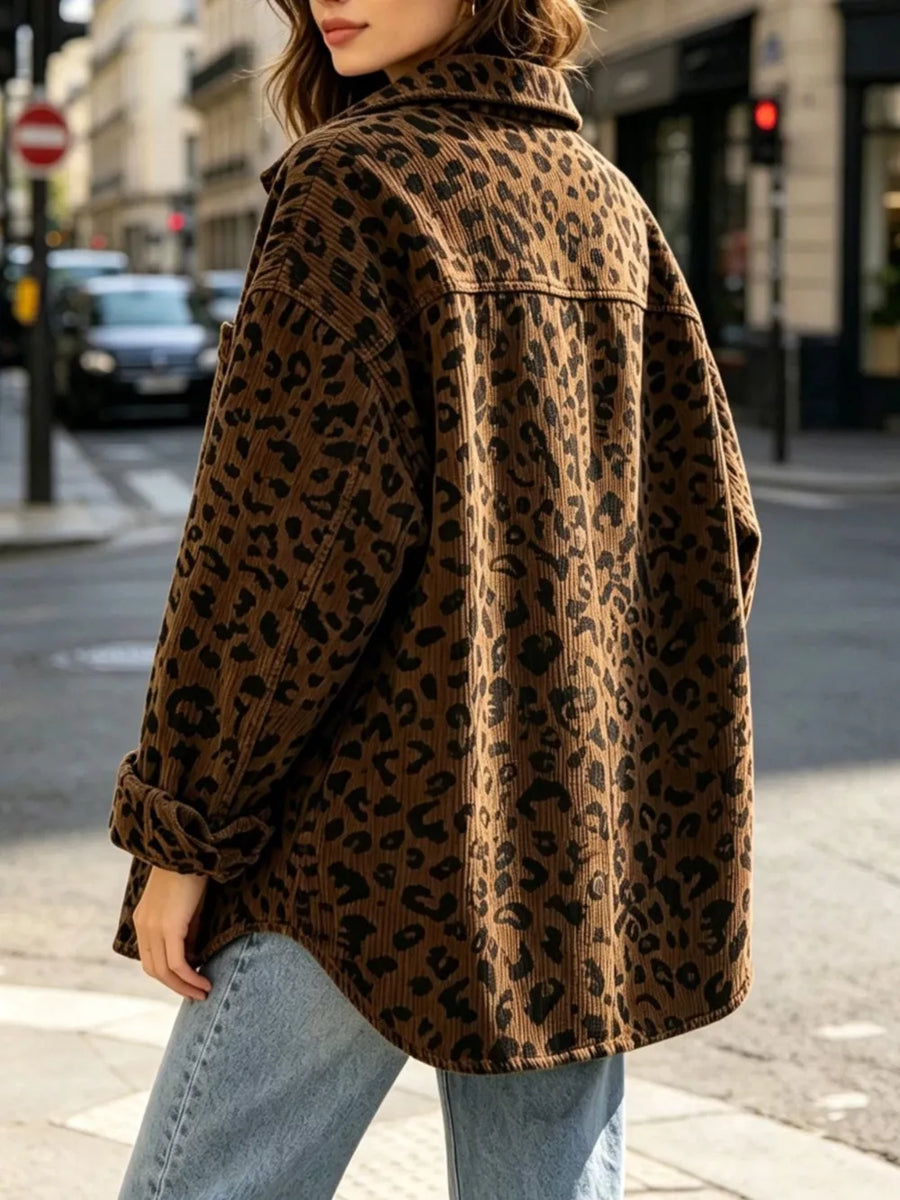 black button-down shirt featuring buttoned and leopard