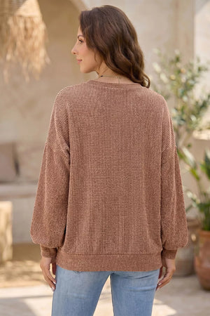 Leopard Print Colorblock Ribbed Knit Blouse in this colorway