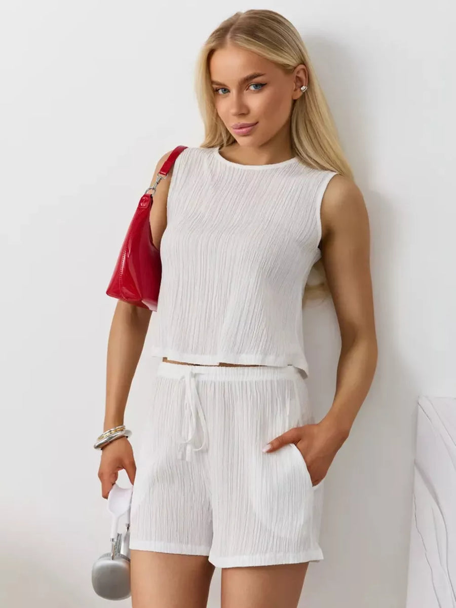 White textured cotton tank and drawstring shorts set with a relaxed fit.