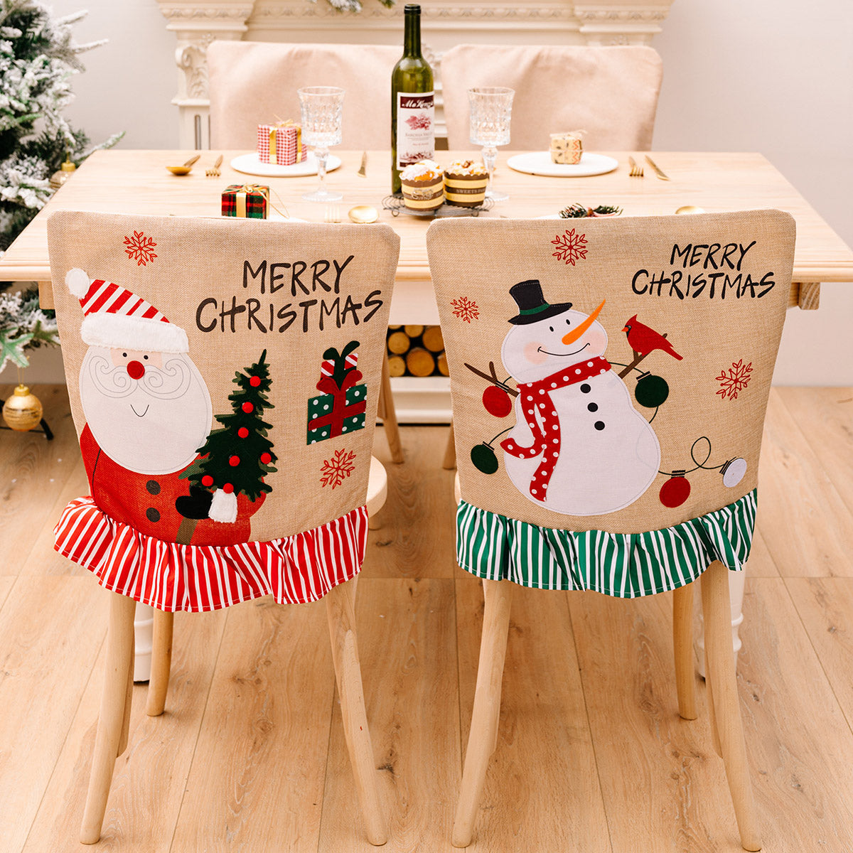 Burlap chair covers with Santa and snowman applique, Merry Christmas text, and ruffled trim.