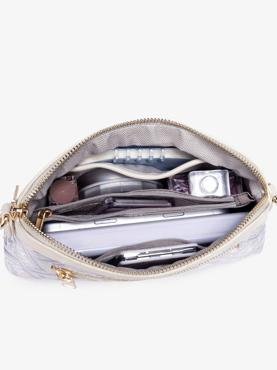 off-white crossbody bag with zip-front and geometric