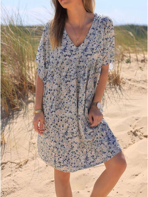 navy blue mini dress featuring pocketed and ditsy floral