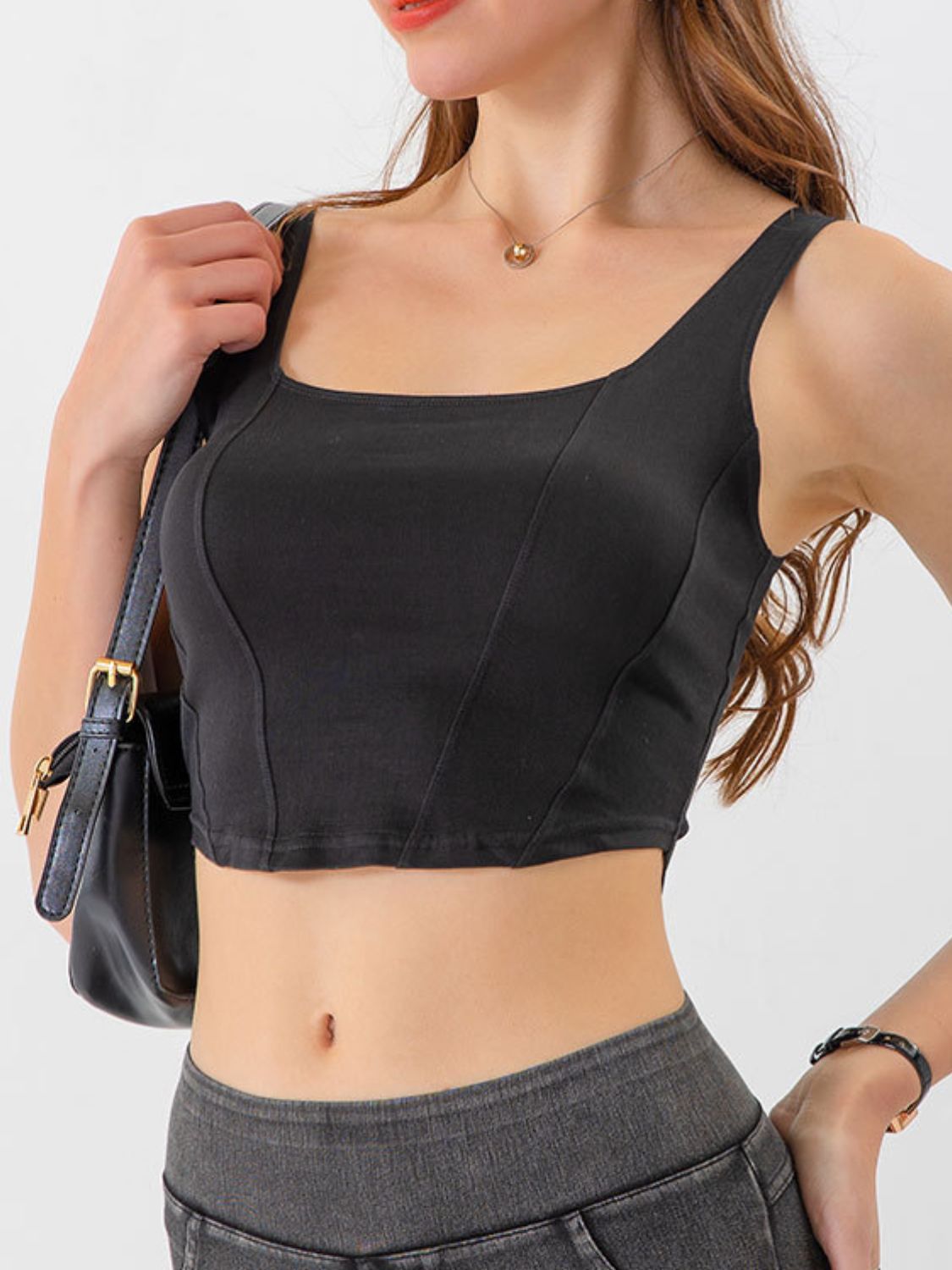 Black denim corset crop top with square neckline and princess seams.