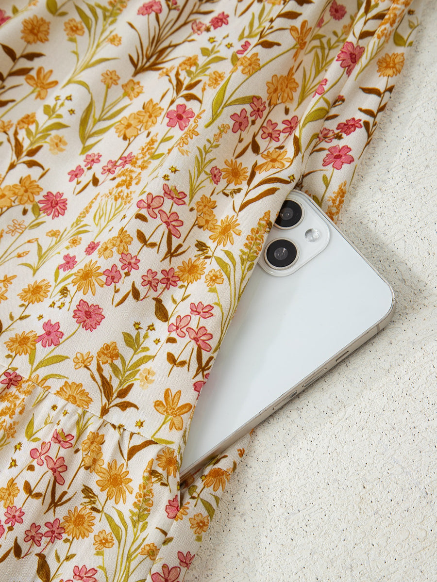 Floral print loose shirt dress with side pocket detail.