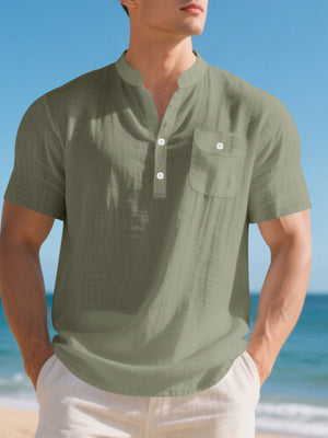 Men's military green cotton band-collar short-sleeve shirt with button-down front and chest pocket.