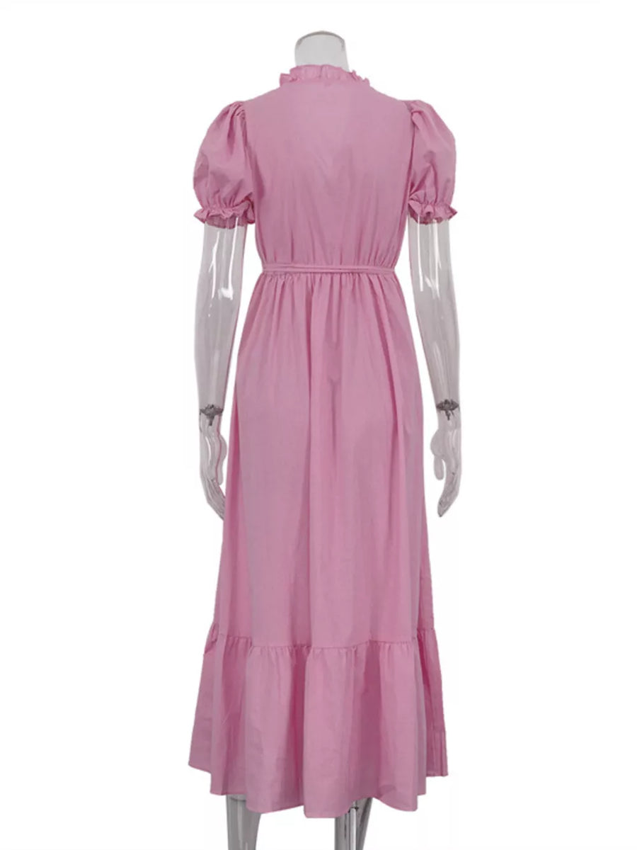 Pink midi dress with ruffled neckline, puff sleeves, cinched waist, and tiered hem