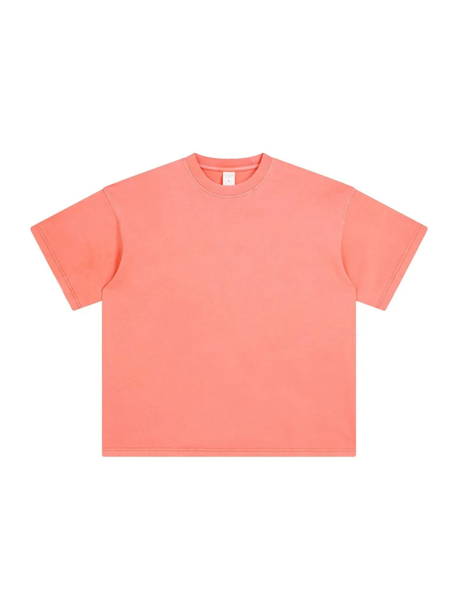 Oversized washed cotton tee in Sherbet with relaxed fit and crewneck.
