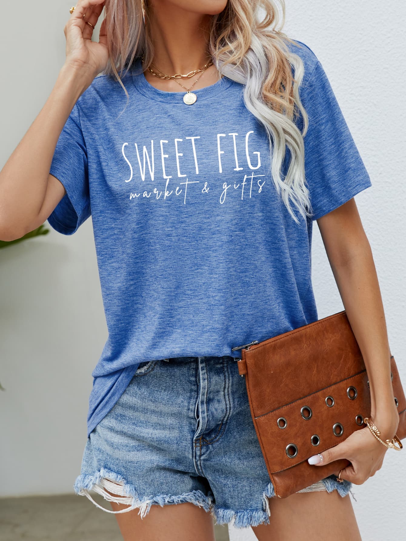 Cobalt Blue graphic t-shirt with white "Sweet Fig market & gifts" text, crew neck, short sleeves.
