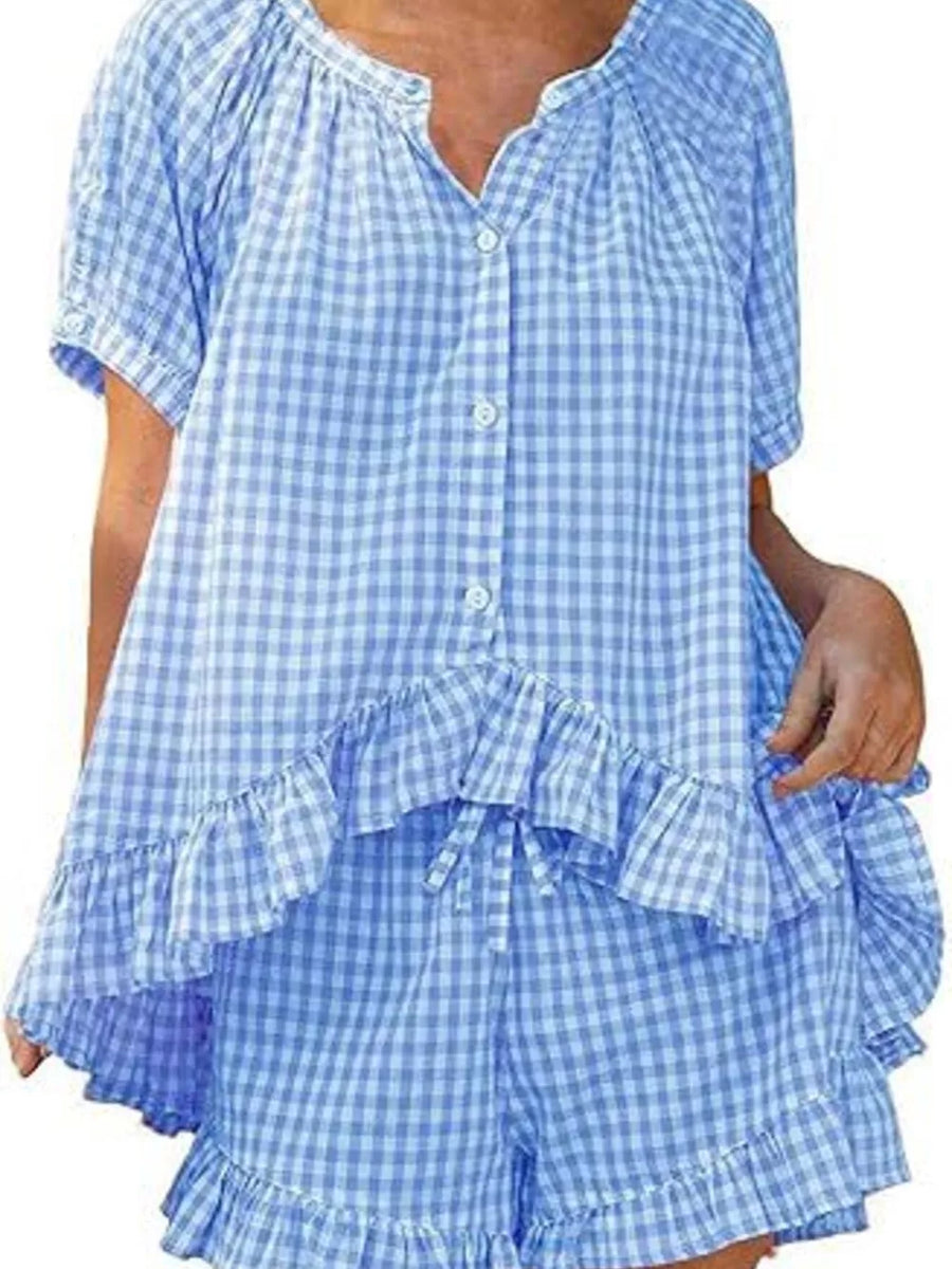 Blue gingham two-piece set with button-front top and ruffled shorts.