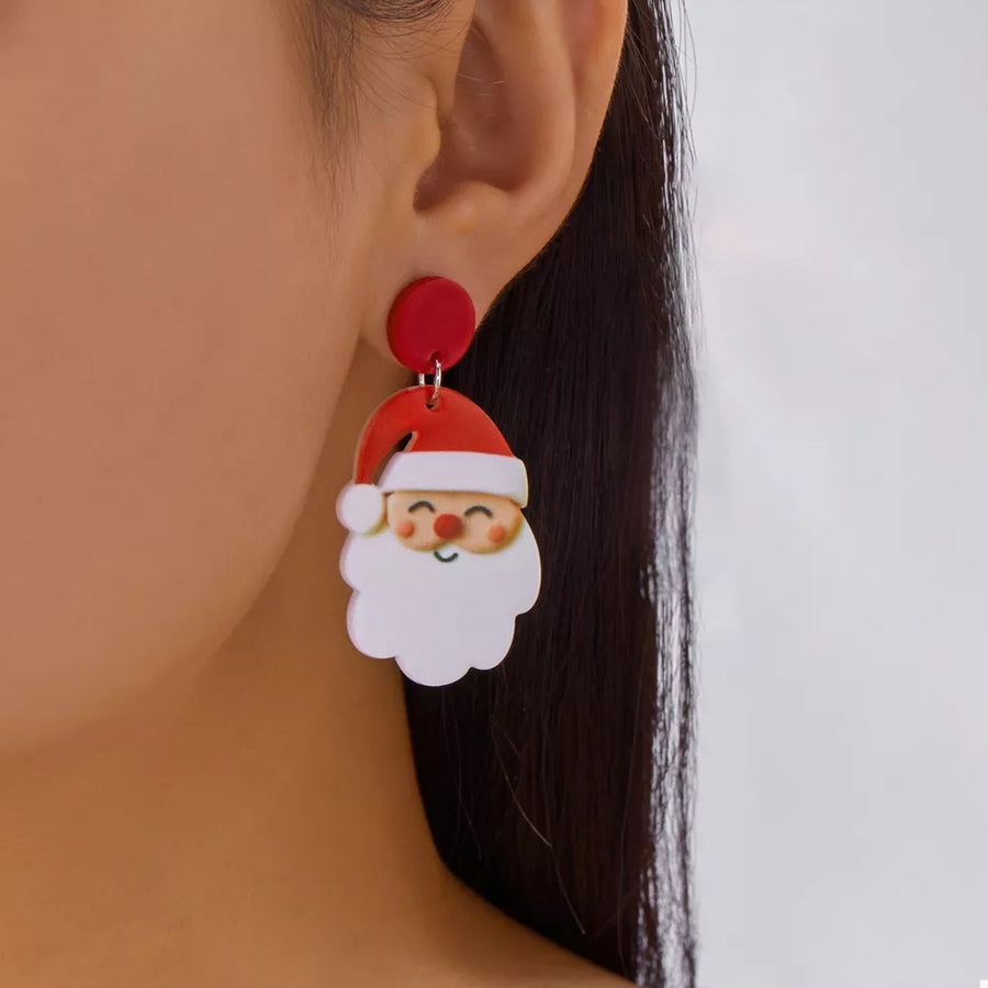 white earrings featuring dangle and graphic print