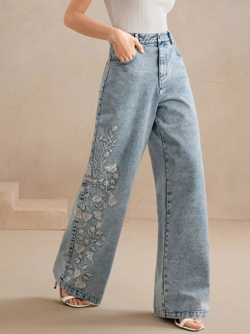 wide-leg jeans in light blue featuring embroidered and wide-leg fit