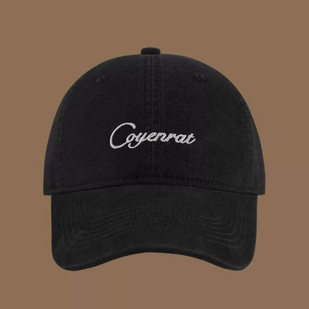 Black baseball cap with white embroidered script logo