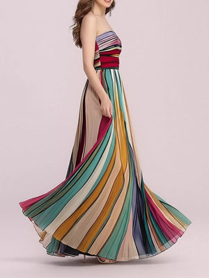 Strapless maxi dress with vibrant vertical stripes and pleated skirt.
