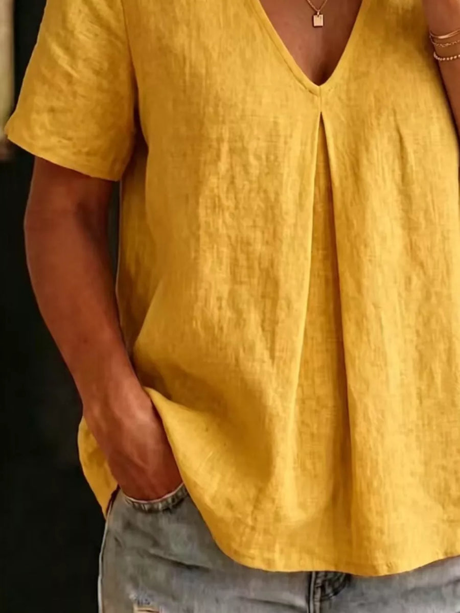 Yellow linen short sleeve v-neck top with front pleat detail