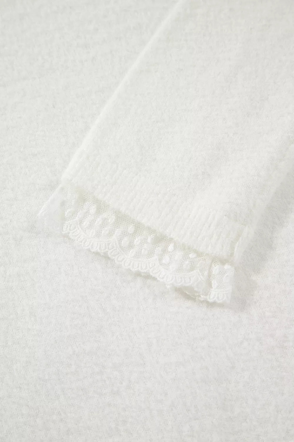 pullover sweater in White with lace trim and hip-length