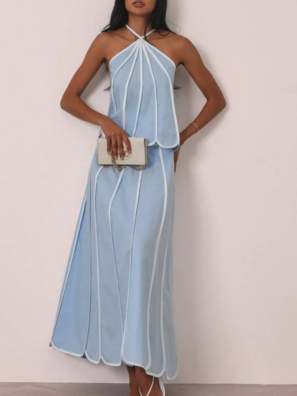 Light blue halter maxi dress with white piping and scalloped hem.