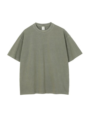 Oversized washed cotton tee in Moss with a relaxed fit and crew neck.
