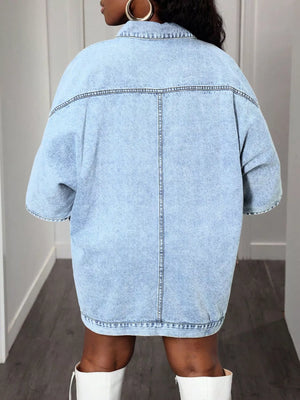 Sky blue oversized denim batwing dress with buttoned front and short sleeves.