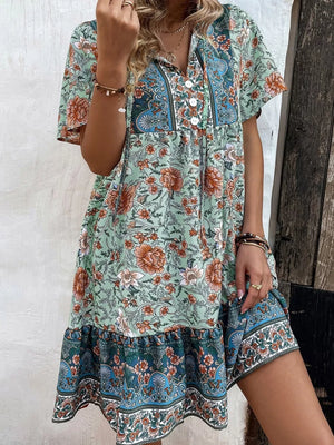 rust orange mini dress featuring buttoned placket and floral