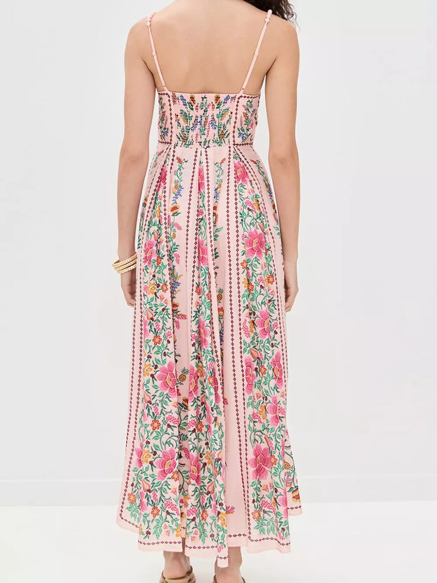 Pink floral maxi dress with sweetheart neckline and smocked bodice.