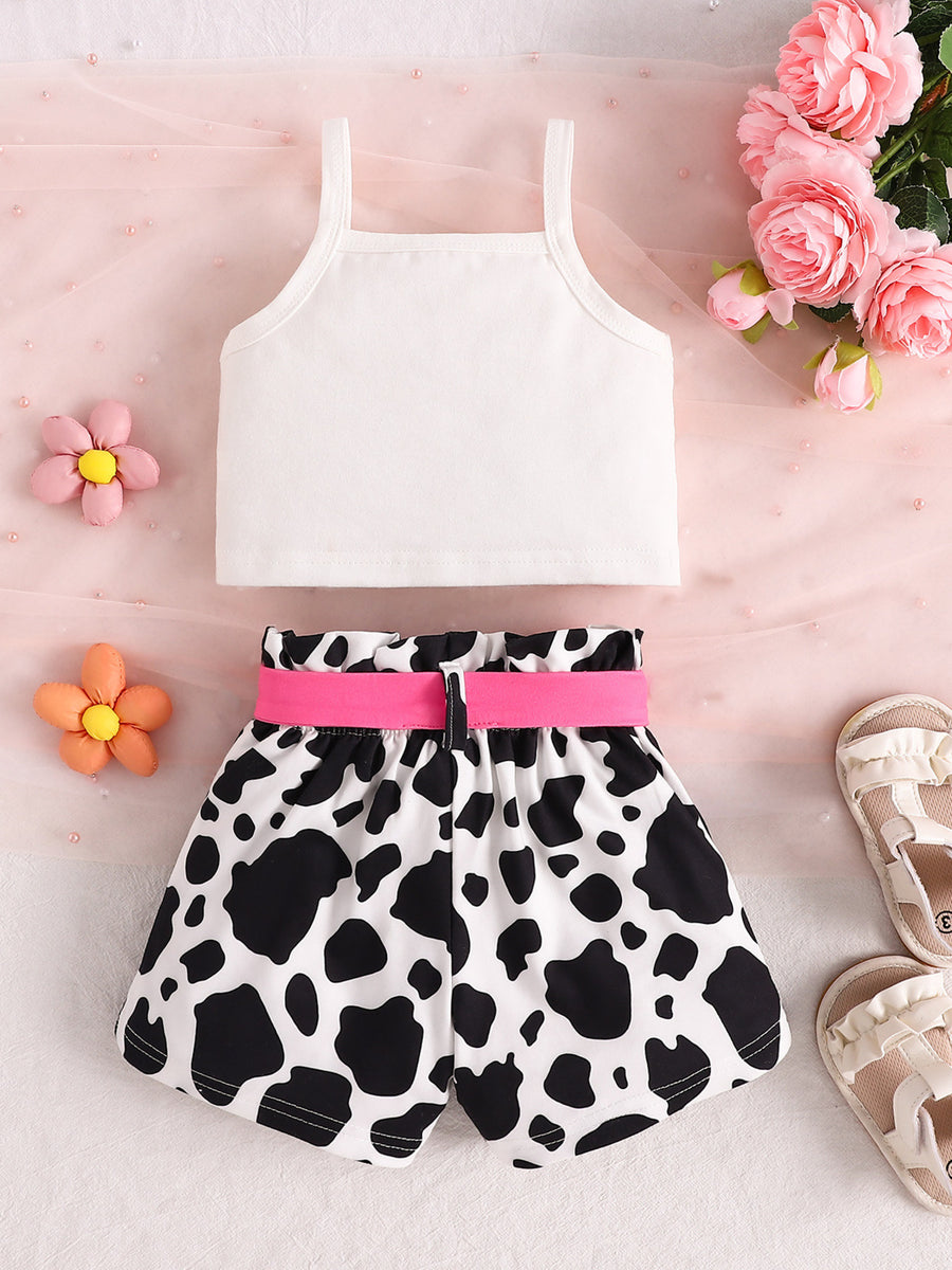 Baby cow print tank top and shorts set with pink belt detail.