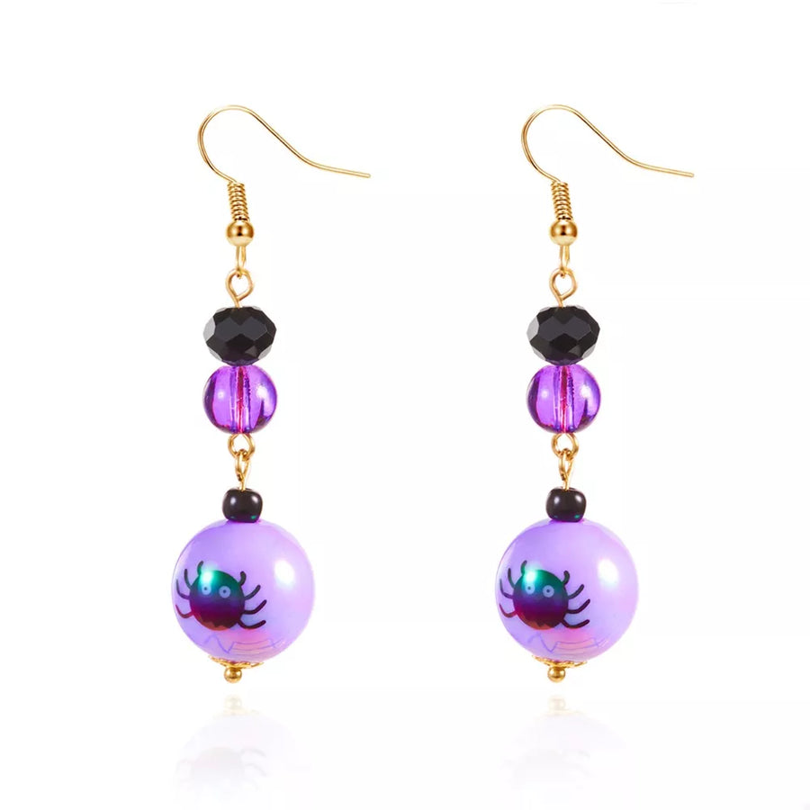 ACCESSORIES in deep purple with spider and beaded