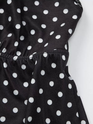 Black polka dot cami with white dots and lace trim detail.