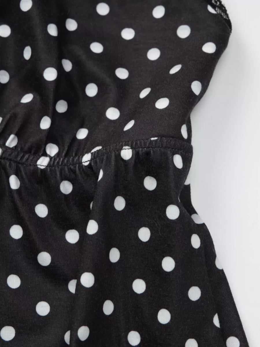Black polka dot cami with white dots and lace trim detail.