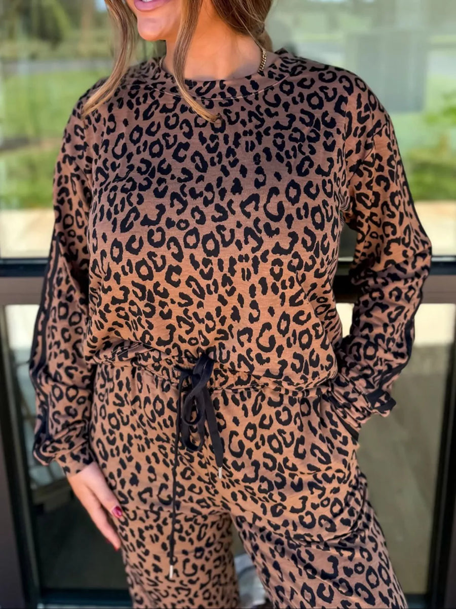 Leopard print loungewear set with drawstring joggers and long sleeve top.