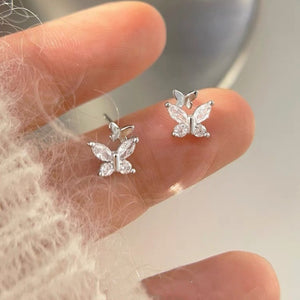 silver earrings with butterfly motif and not applicable