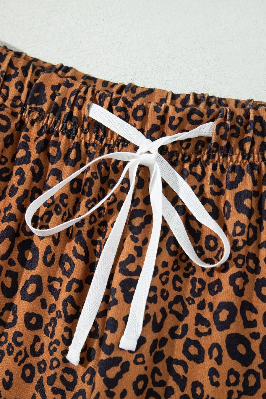 pajama set featuring leopard-print in dark brown with 95% polyester, 5% elastane Care instructions: Machine wash cold texture