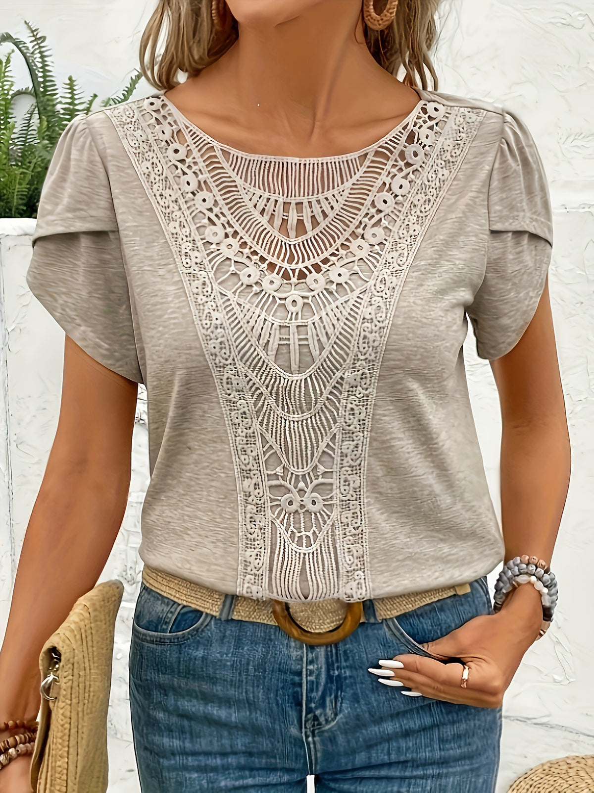 Grey lace trim petal sleeve top with cutout neckline detail.