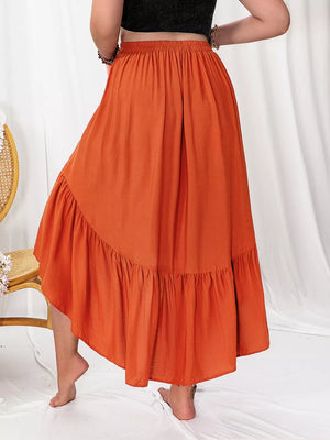 Orange ruched high-low skirt with ruffled hem, elastic waist, and flowy A-line cut.